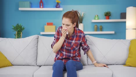 Young-woman-covering-her-mouth-and-nose-while-coughing.